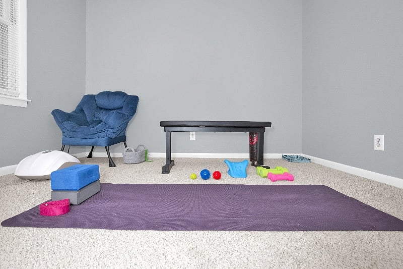 Self-Care room with automatic foot massager, exercise bands, weights and TV to view your favorite exercise videos.