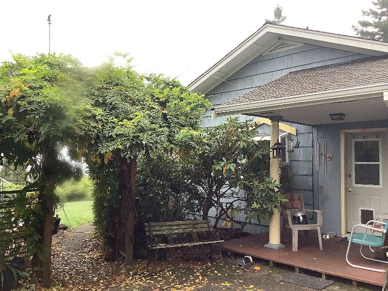 Front door + porch. This is the primary entrance to the home.