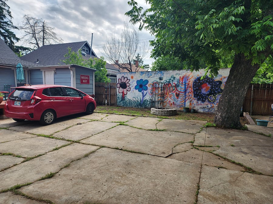 Parking off street. One space for front house 2 spaces for back house. We have a Graffitti Art wall that you are welcome to try your hand at. It changes from Tenant to Tenant