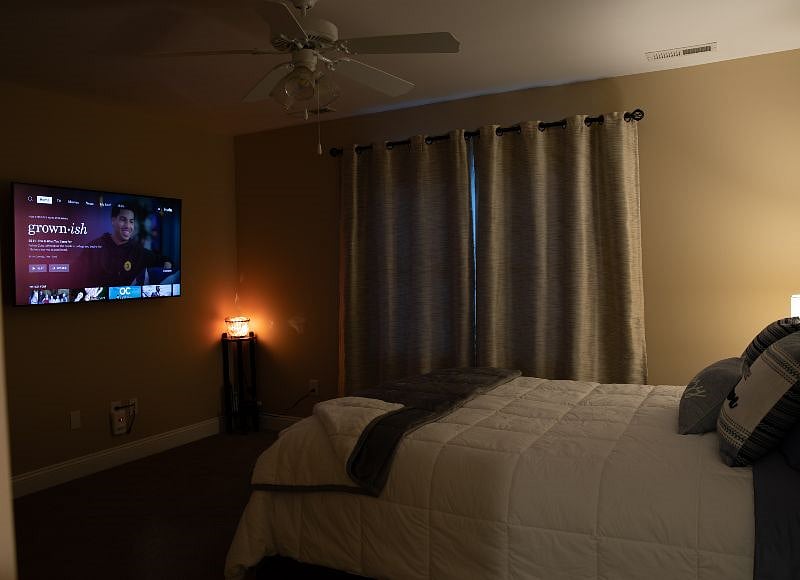 Blackout Curtains for night shift workers. 55" inch TV with access to most streaming platforms.