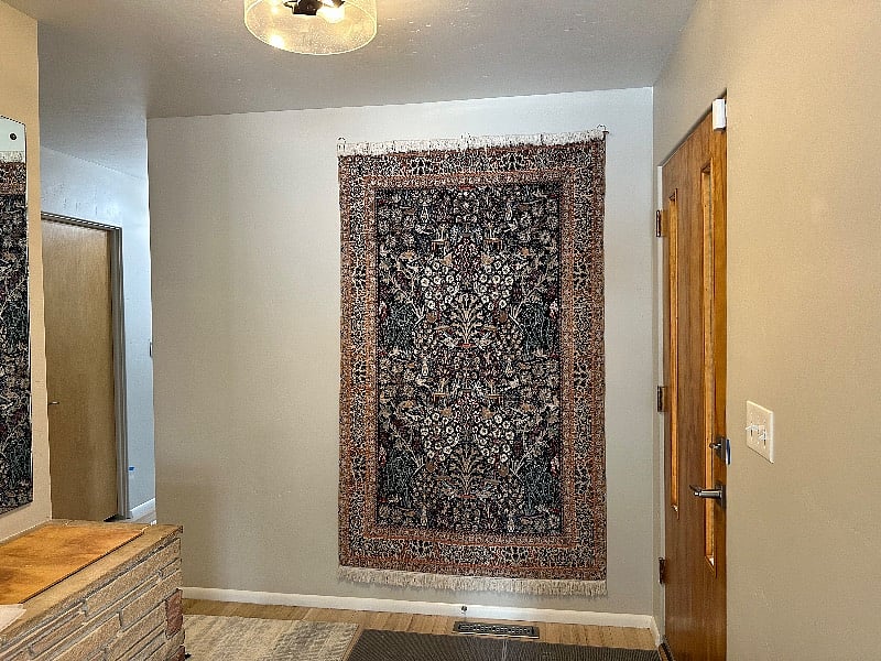 interior private front door on right, wing on the left