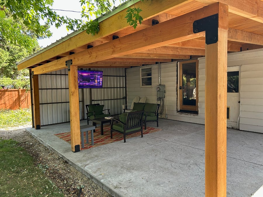 New construction - covered outdoor patio and entertainment space