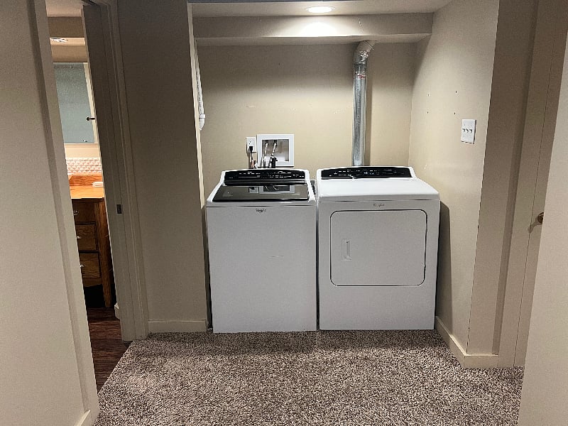 full sized washer/dryer located in basement
