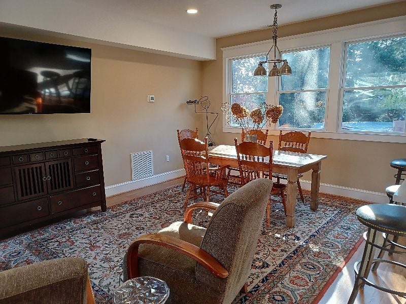 Comfortable dining on this kitchen table with plenty of natural light--and very quiet.