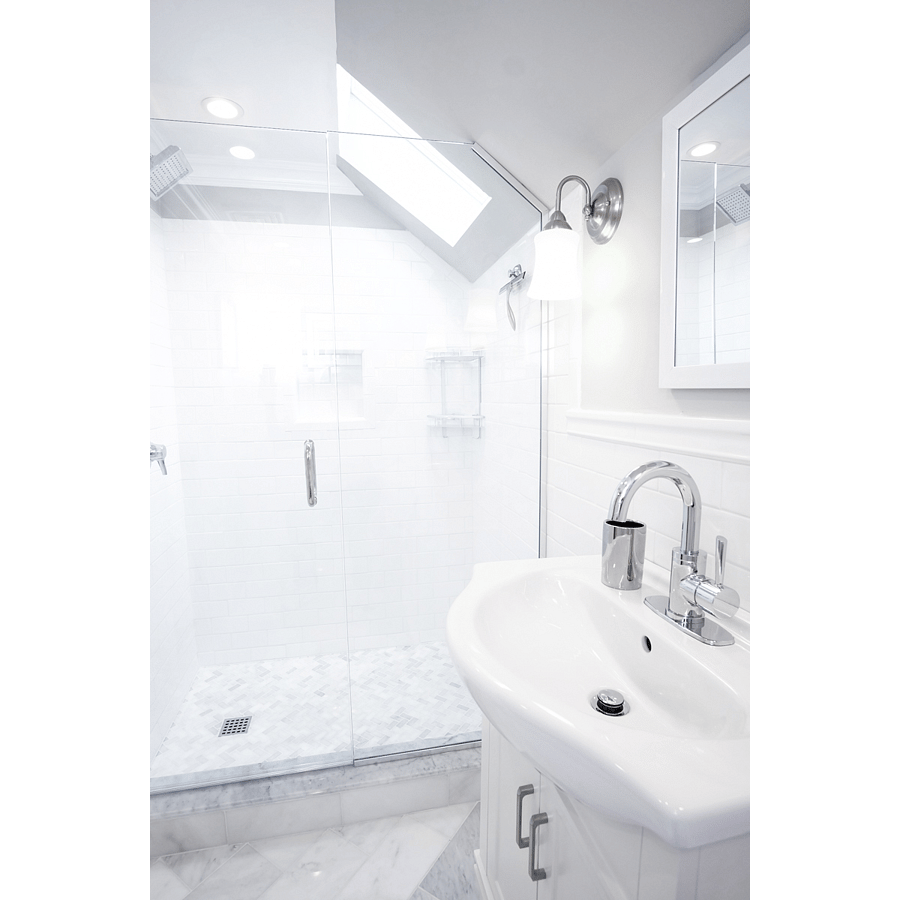 Private marble tiled bathroom with rainwater shower head