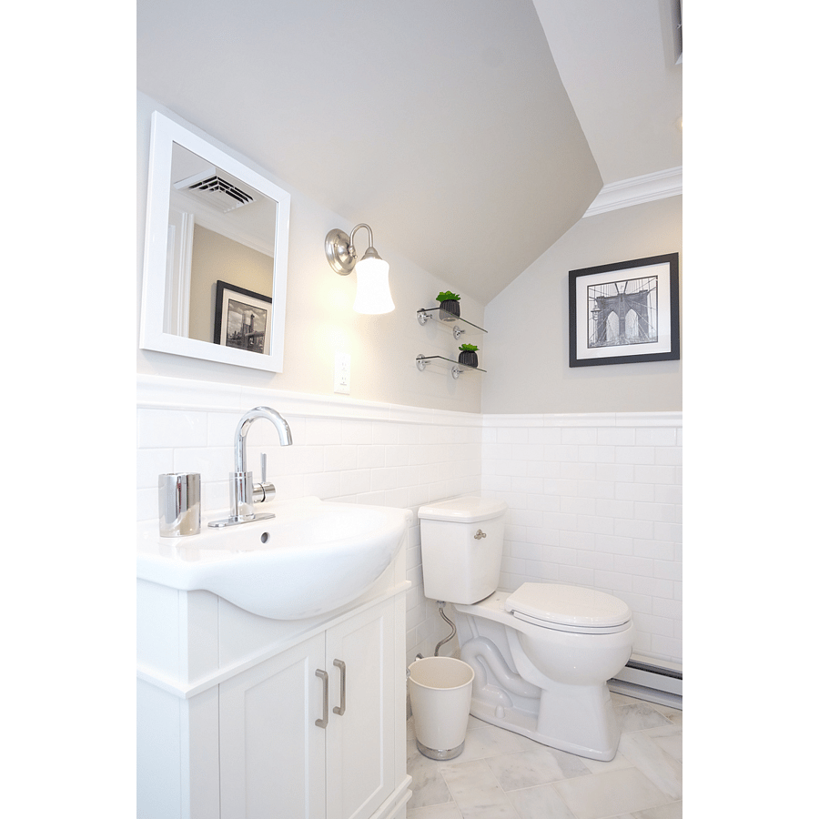Private marble tiled bathroom with rainwater shower head
