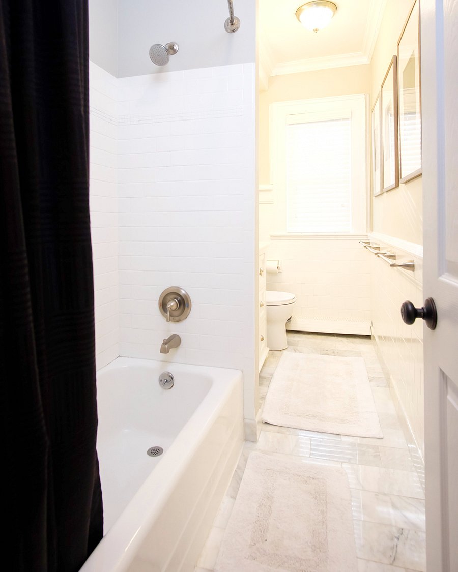Marble bathroom with tub and shower