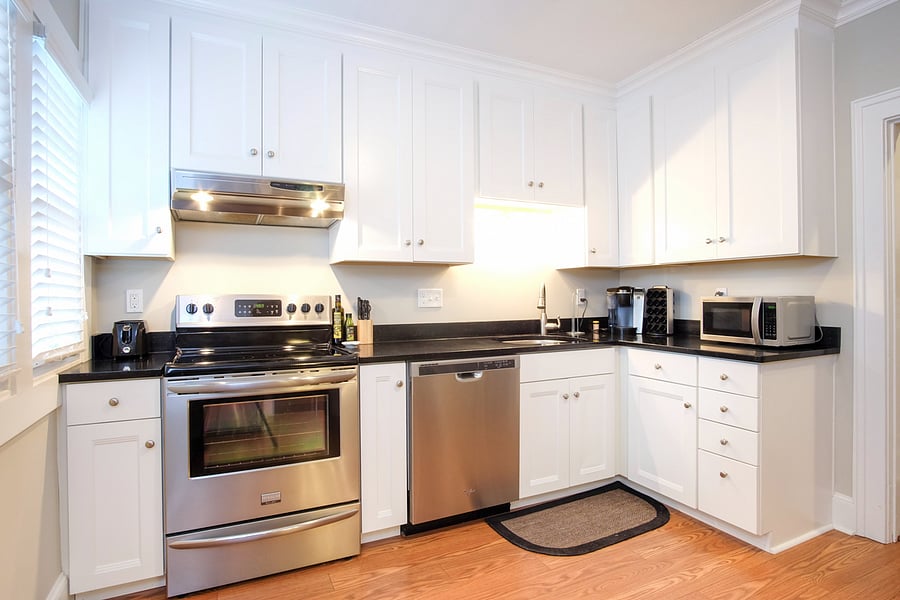 Fully stocked kitchen with everything you need in terms of cooking supplies.