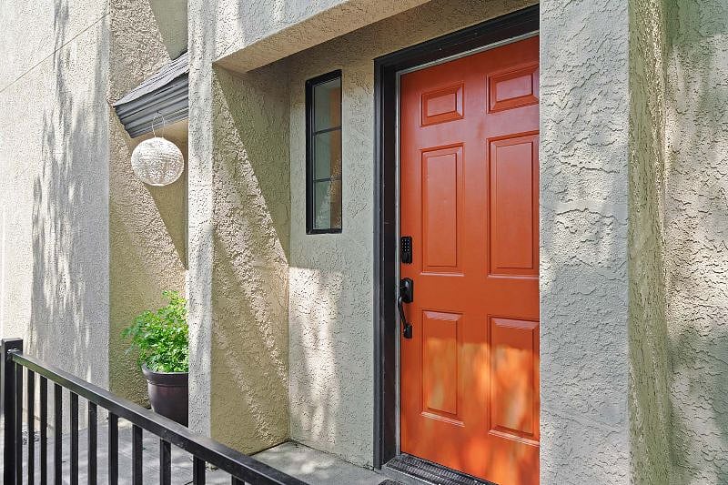 Entrance to common area with stairway leading to apartment and also shared, free washer and dryer. Herb garden next to the door for your cooking needs!