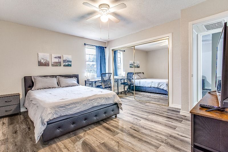 Bedroom #2, Featuring a Plush Queen Size Bed, Dedicated Workspace, Nightstand, Dresser, Closet, Ceiling Fan & More