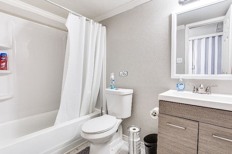 Stunning Guest Bathroom Stocked with Toilet Paper, Body Wash, Soap, Shampoo and Other Essentials