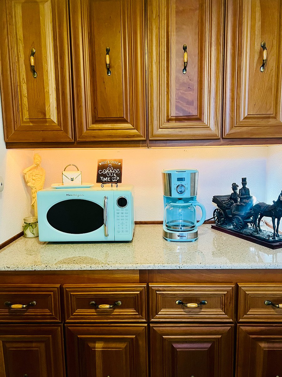 Small kitchenette area for pantry items and coffee area is conveniently located in the hall room outside your room!