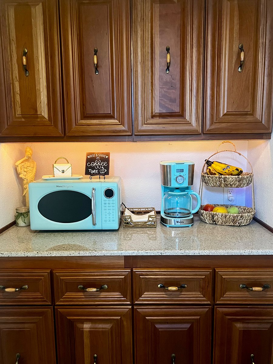 Kitchenette area with pantry storage