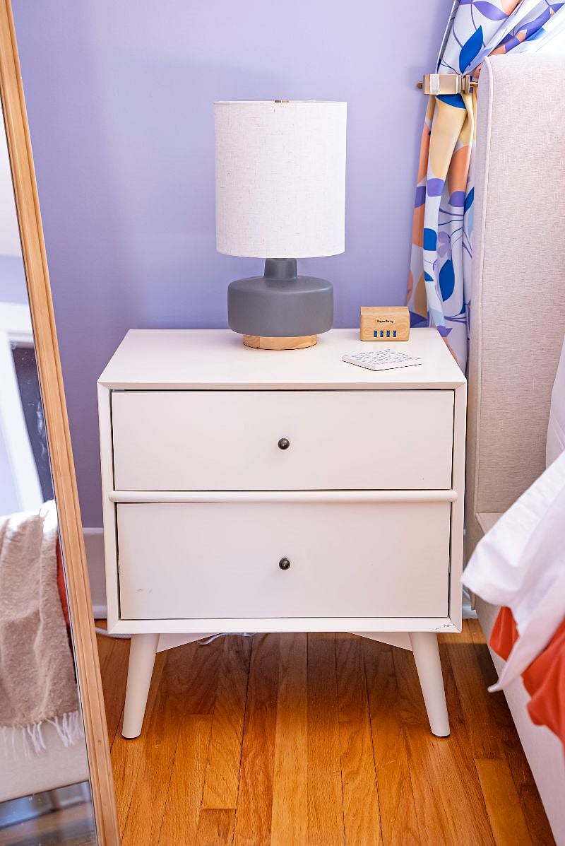 Nightstand in primary bedroom