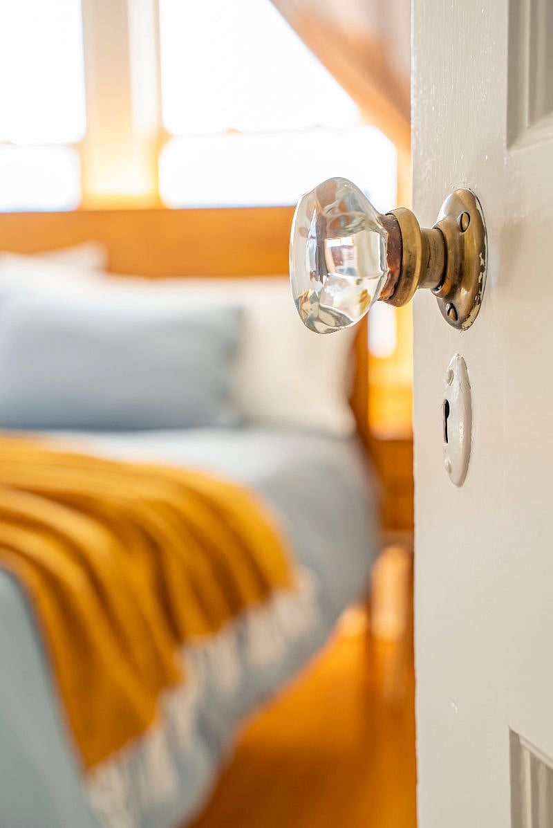 Original doorknob in secondary bedroom