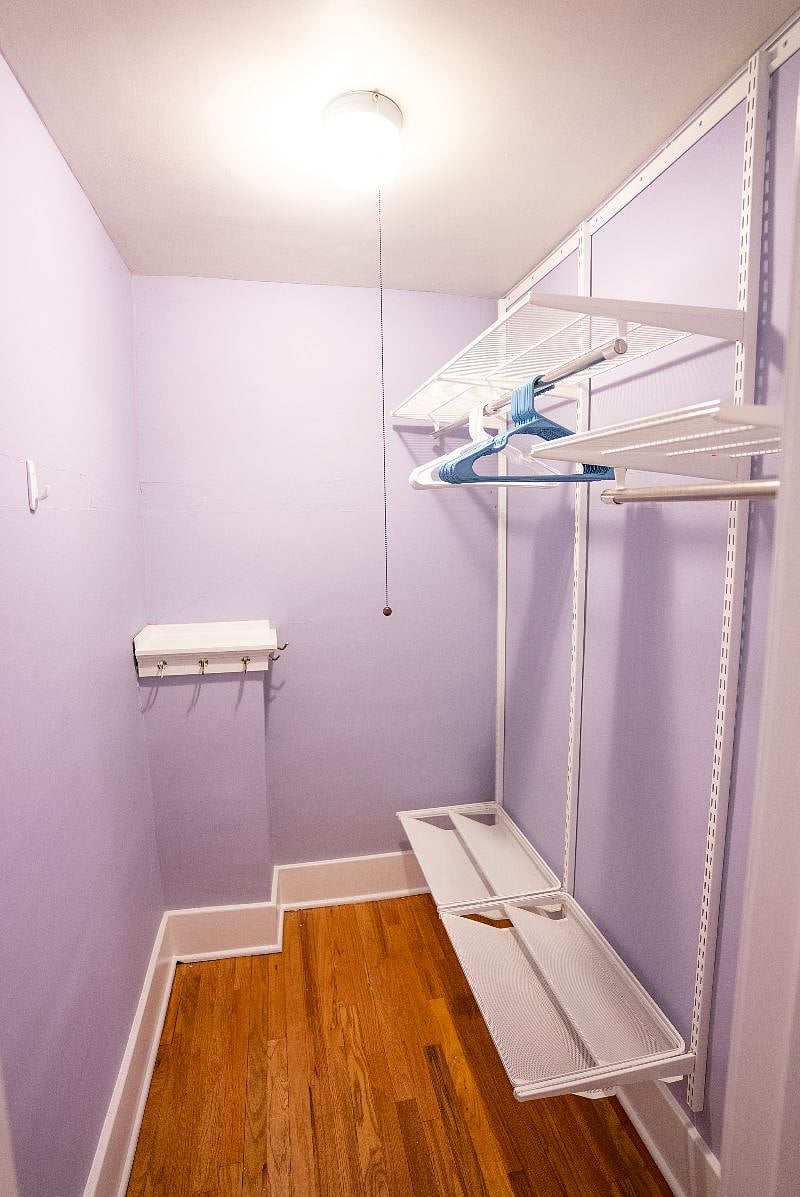 Walk-in closet in primary bedroom