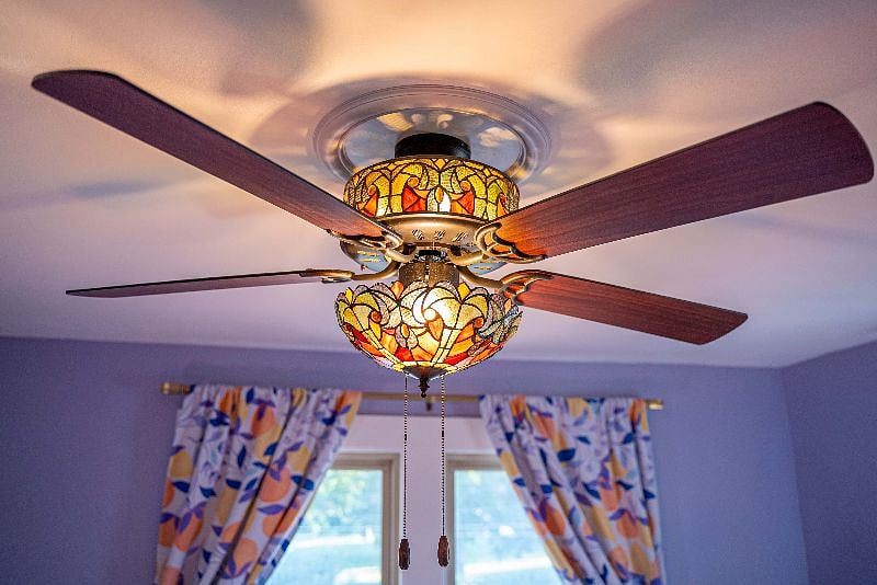 Ceiling fan in primary bedroom