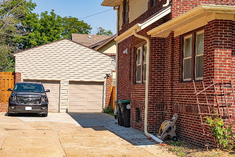 Driveway and garage (former carriage house) 