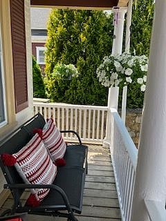 2 person swing bench located in the front farmers porch.
