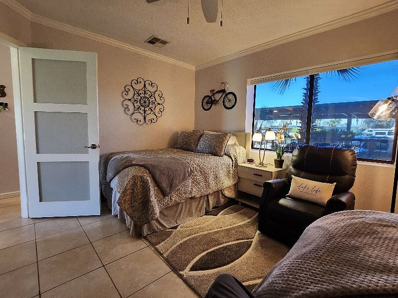 2nd bedroom with recliner/seating area to relax and read or watch TV.