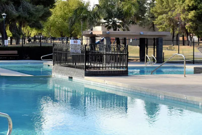 Community Pool & Hot Tub - Cool off in the sparkling community pool or unwind in the hot tub after a long day of work, travel, or exploring Mesa.