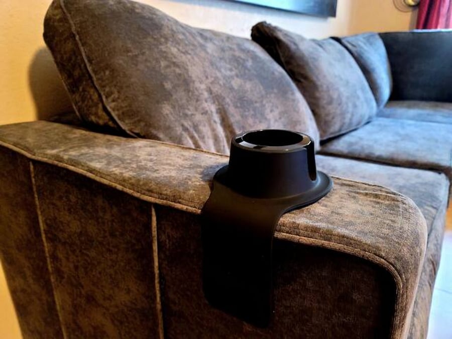 Kick back and relax in style with our Lovesac sofa! Say hello to the ultimate lounging experience, complete with versatile cup holders to hold your favorite beverages.