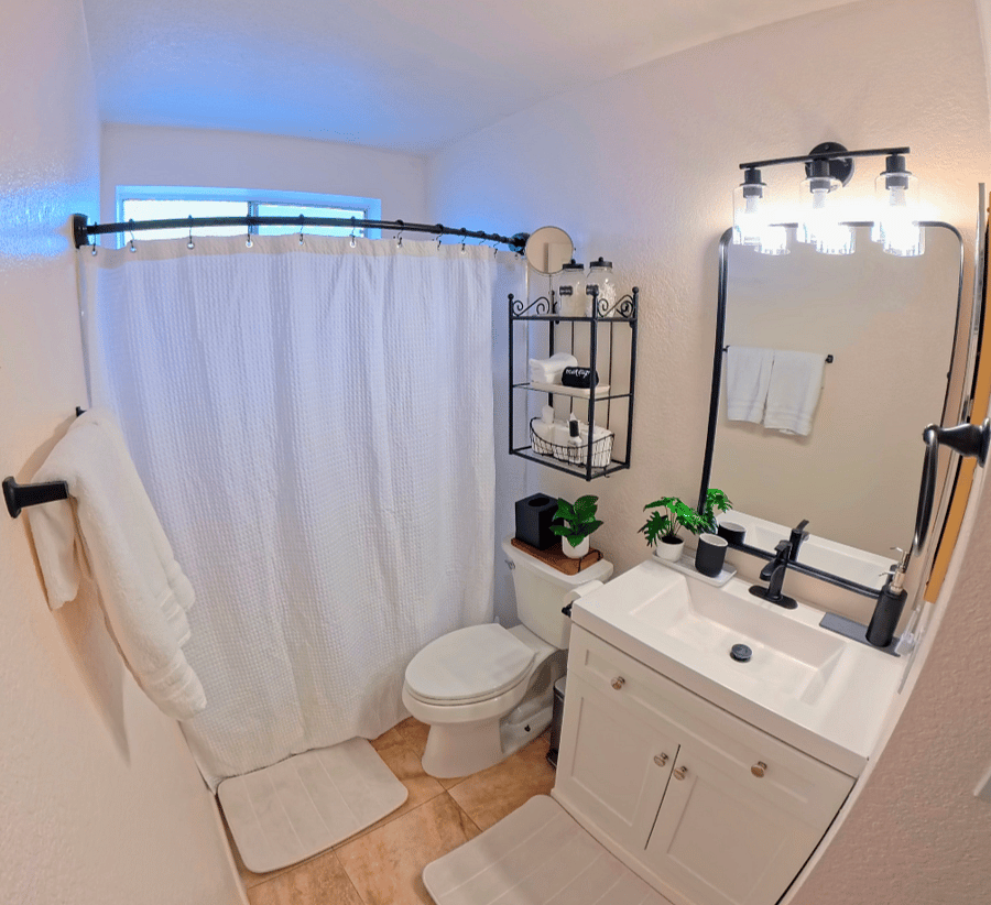 Queen Guest Bathroom - Bright, clean, and fully stocked with fresh towels and essential toiletries for a comfortable stay.