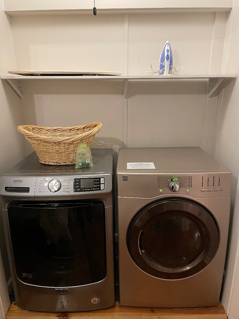 Washer & Dryer inside with iron & tabletop ironing board