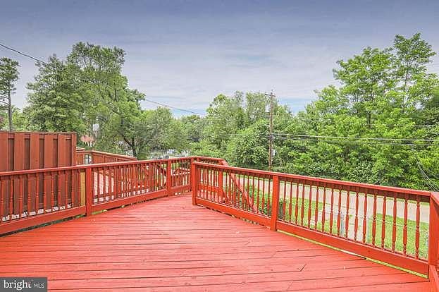 Deck Overlooking Backyard - Shared Space includes Weber Charcoal Grill with Electric Igniter