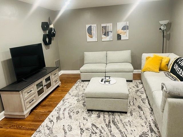 Main Floor Living Room with 55 inch Smart TV - Shared Space 