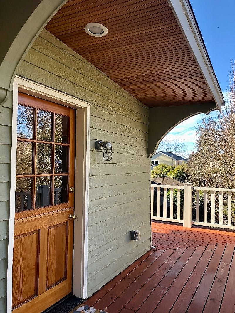 Dutch door entry with wrap around deck