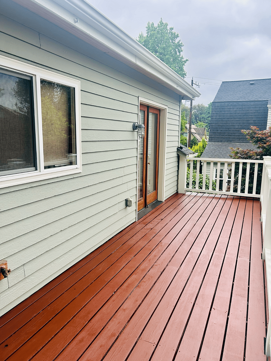 large deck with newly painted exterior