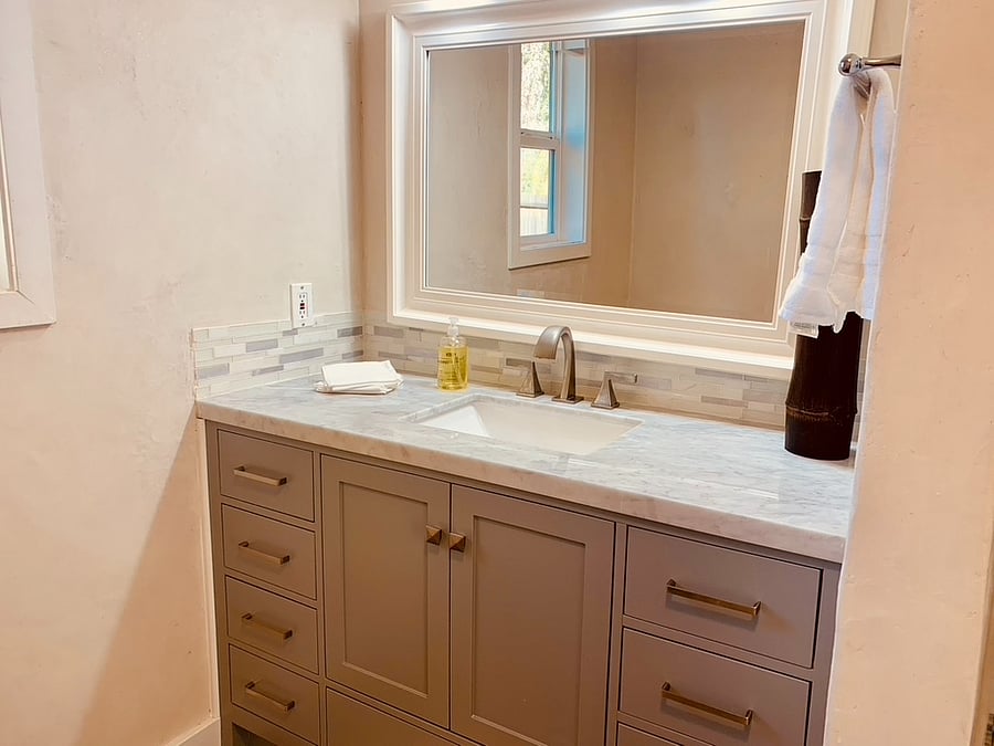 Hallway bathroom remodeled and nicely equipped with spacious vanity and bath/shower combo