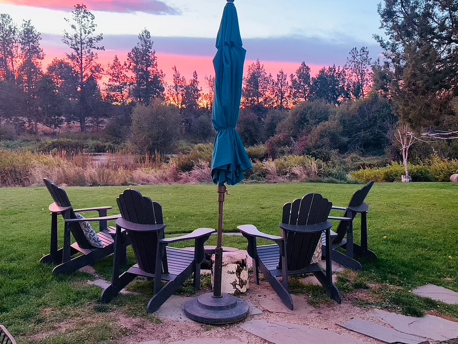 Enjoy warm fires and smores at the firepit overlooking the large yard and river