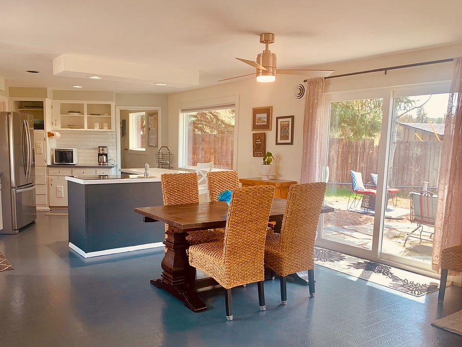Built in leaves and extra chairs easily increase for larger seatings!