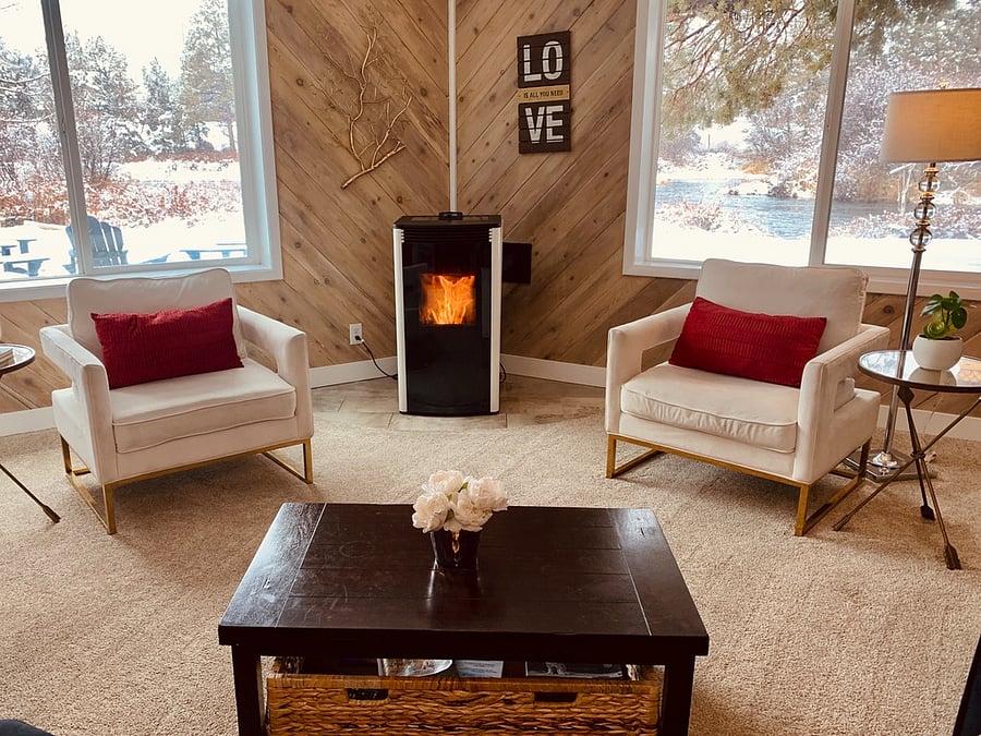 Pellet stove with real fire is an easy push of the button or will automatically run on schedule