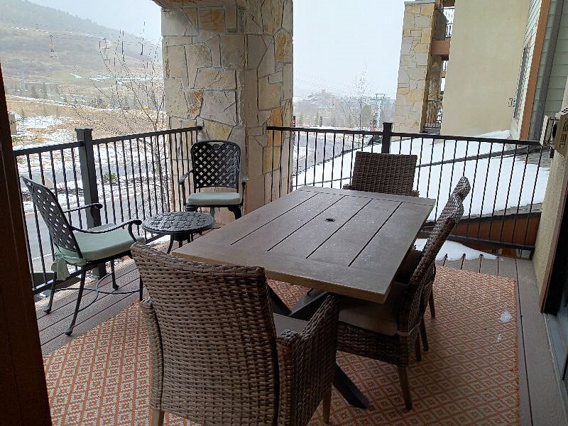 The balcony seats 8 and has a phenomenal mountain view.