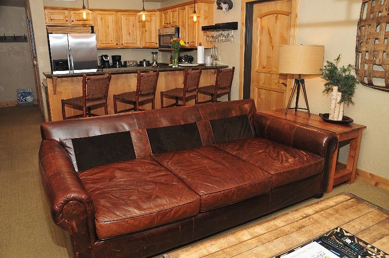 Without the back pillows, the sofa is 4 ft deep and about the size of a twin bed. Comfortable for a single person without needing to pull out the mattress.
