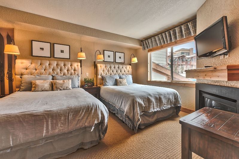 The spacious second bedroom features 2 Queen size beds with newly replaced luxury mattresses.