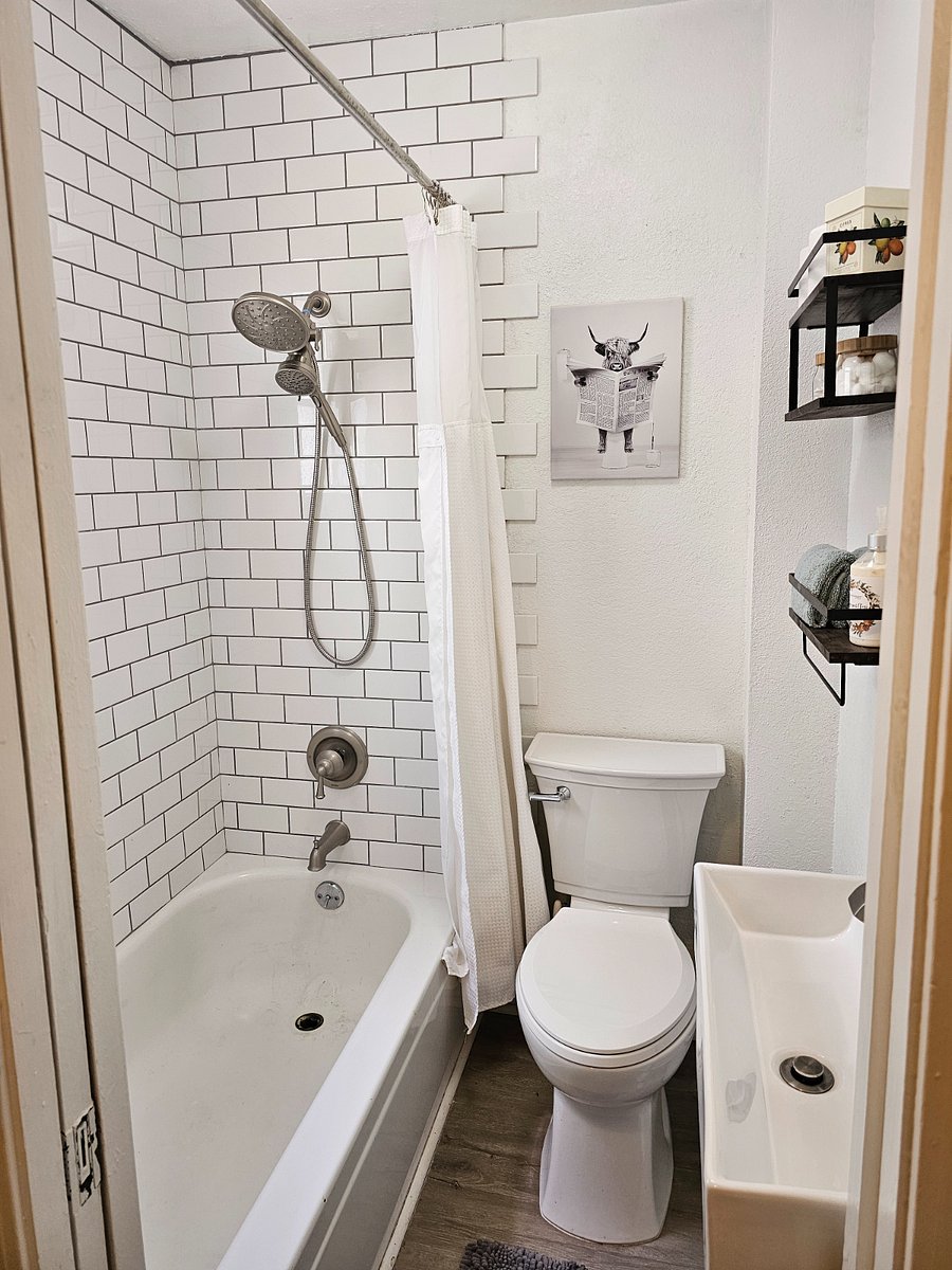 a "quaint" bathroom where you can do your business on the toilet....soak your feet in the tub and wash your hands in the sink all at the same time!!!!