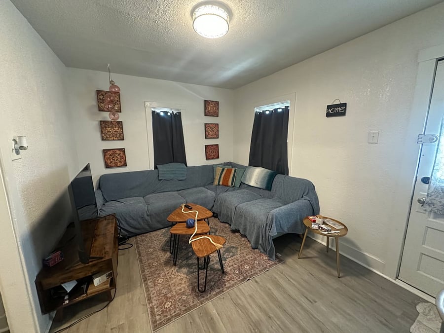 Living room with smart TV....and more blackout curtains!