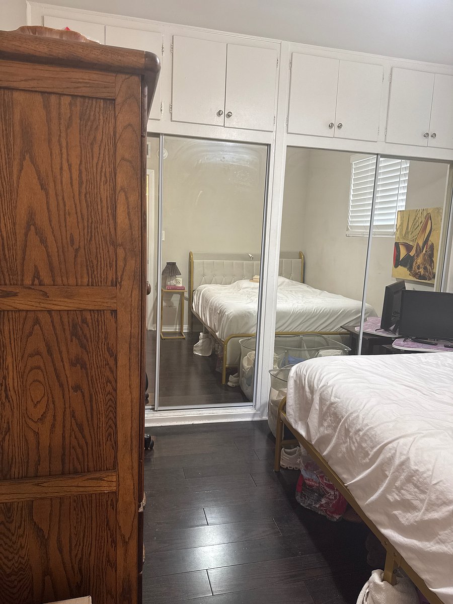 Private Bedroom Armoire, window w/blind.
One large sliding door Closet. 4 full length mirrors.