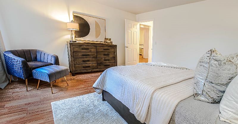 Primary bed- read your favorite book in this plush comfortable chair.