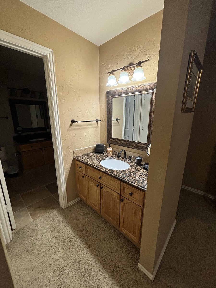 split vanity across from closet
