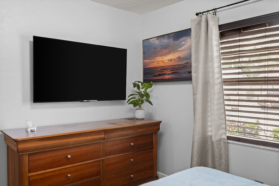 2nd Bedroom : Enjoy the convenience of a second bedroom stocked with plush towels, 55inch Smart TV, and Queen size bed.,