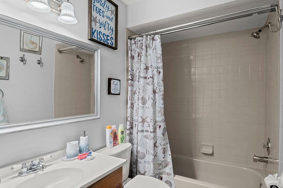Fully stocked bathroom with all the needed amenities: shampoo, conditioner, body wash, and more!