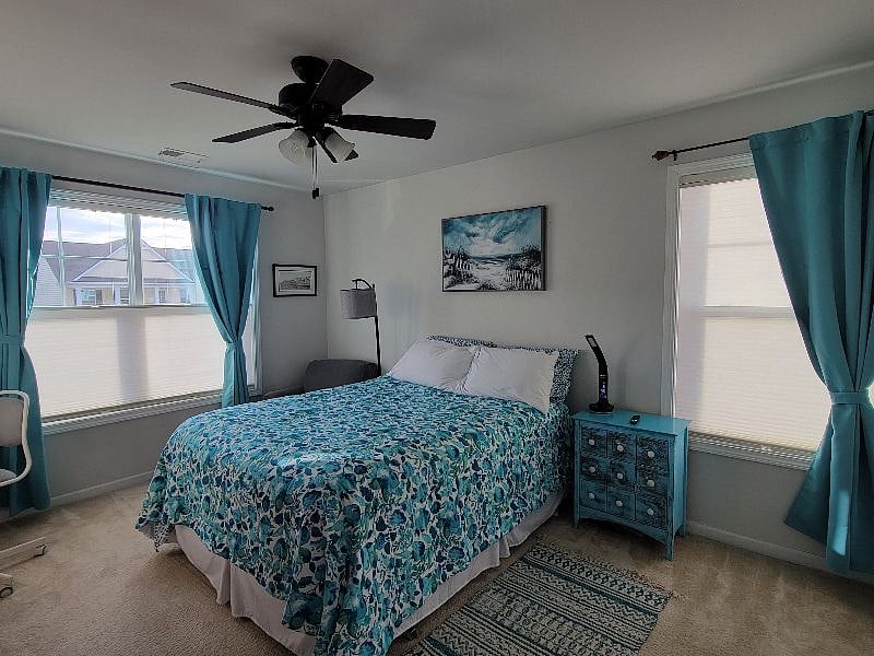 Queen size bed. Shades and Blackout Curtains