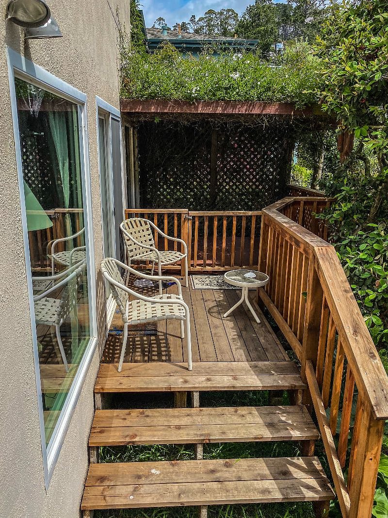 Private deck outside entrance to apartment.