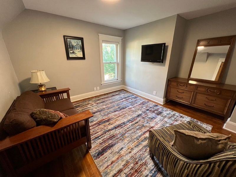 TV room in your suite. Adjoining room is the office (not pictured)