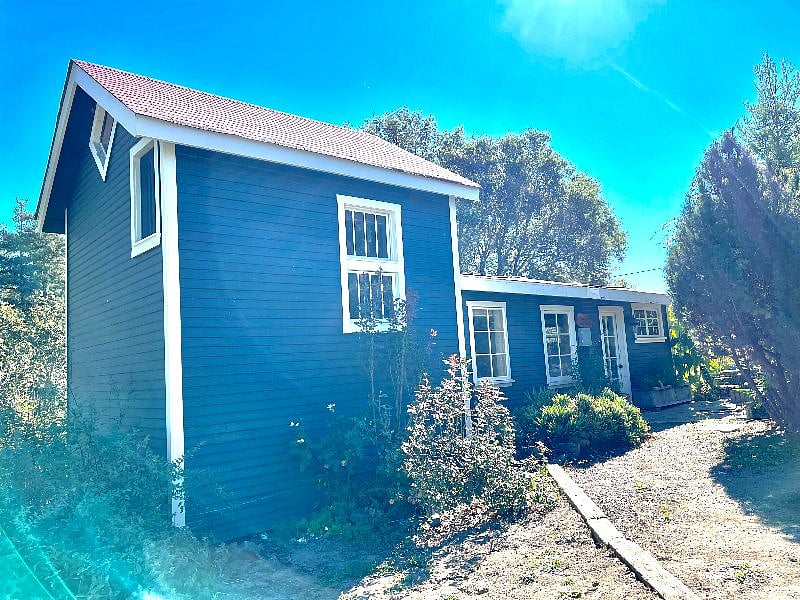 Built in 1900 as a water tower, the exterior has been maintained with tasteful updates to the interior (kitchen and baths).
